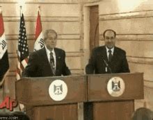 bush shoe gif|bush dodging shoe gif.